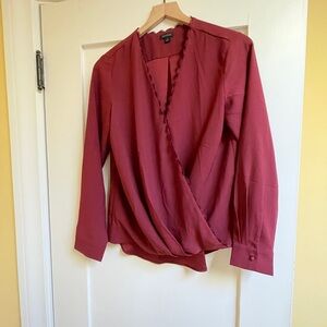 Ann Taylor Elegant Burgundy Wrap Top
NWOT never worn